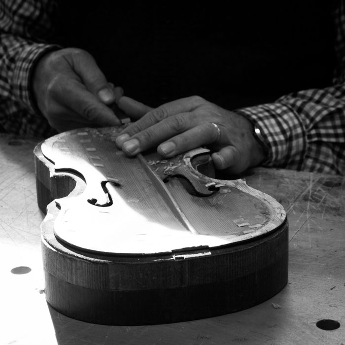 Kevin McElroy restoring a violin